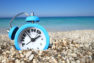 Clock on beach